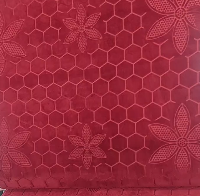 Solid-color embossed carpet